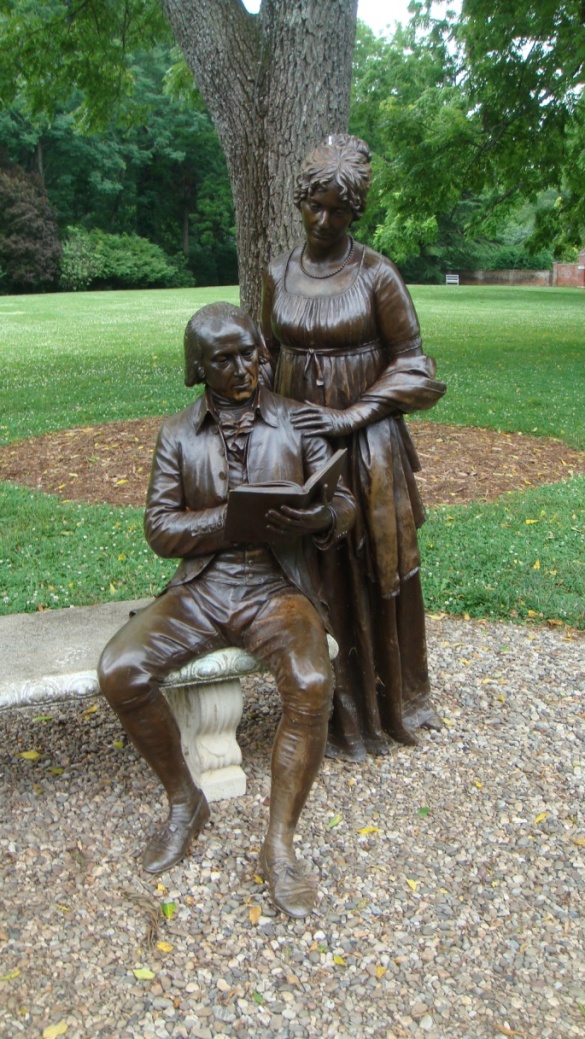 A metal statue of James and Dolly Madison.